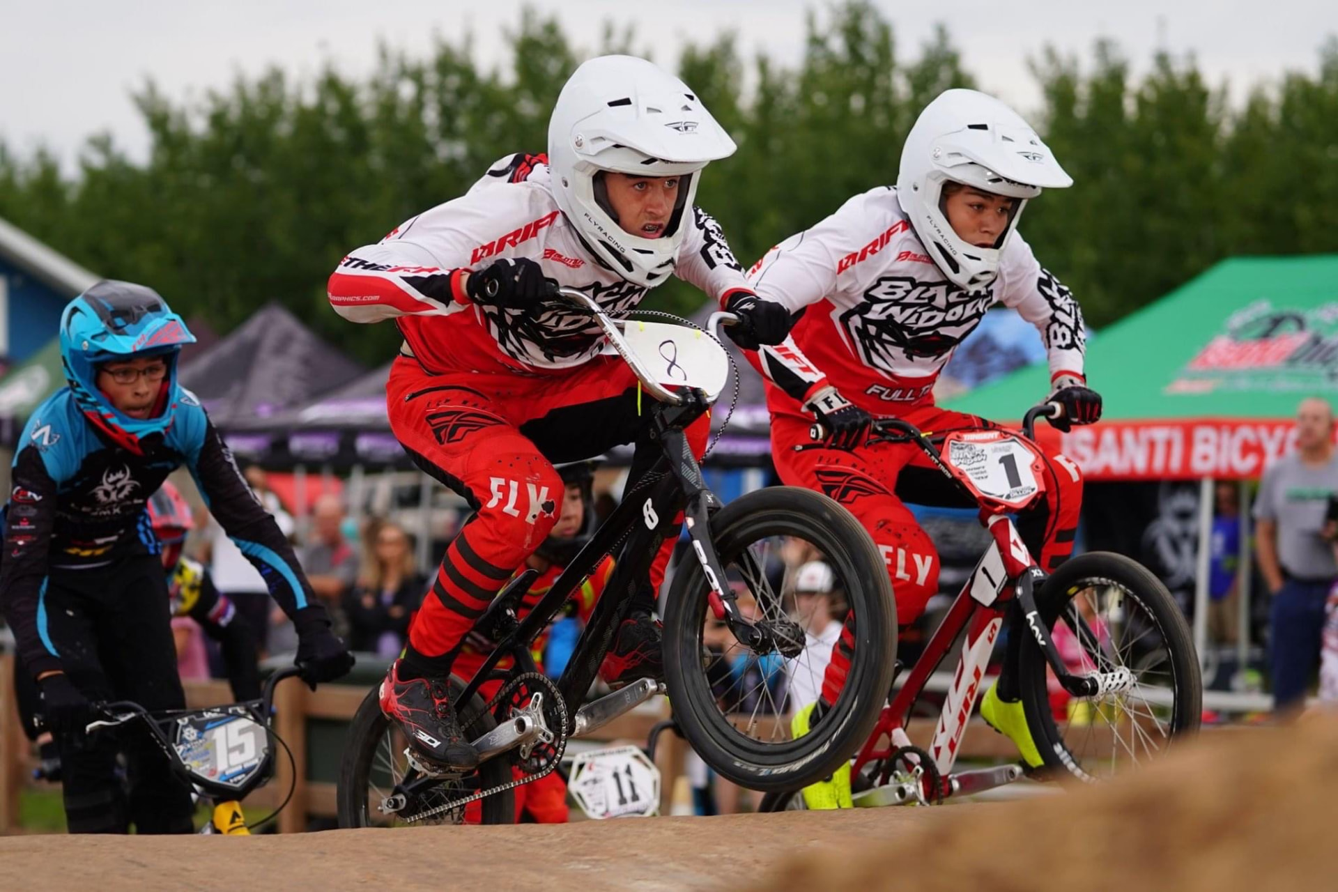 Cole Isaacs racing out of the first turn on the BMX national circuit